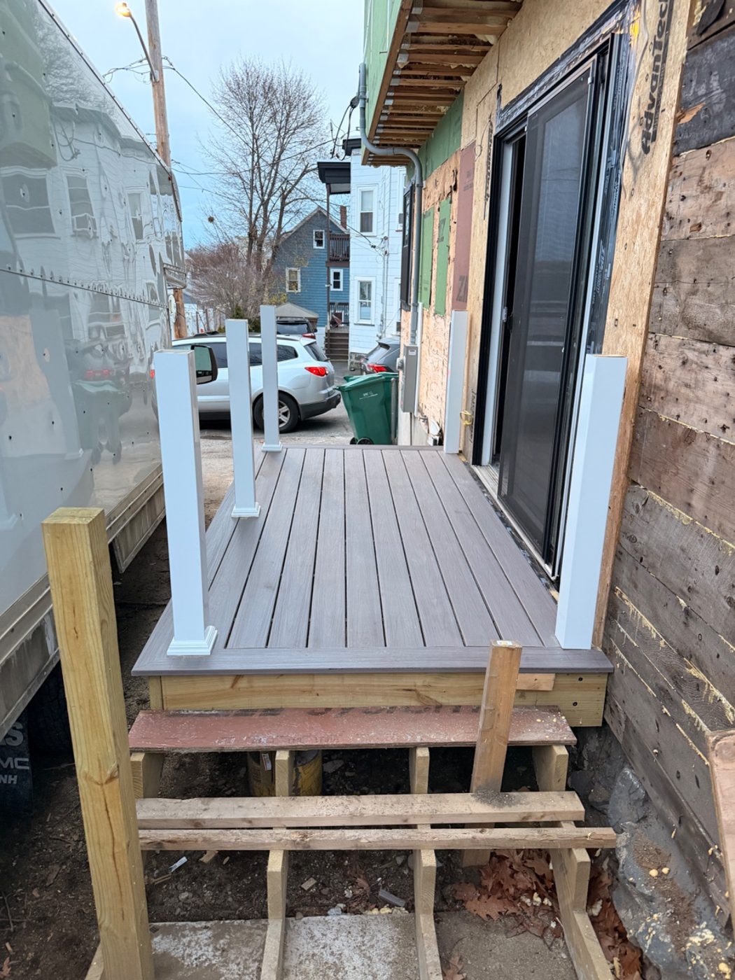 New composite deck by a sliding door