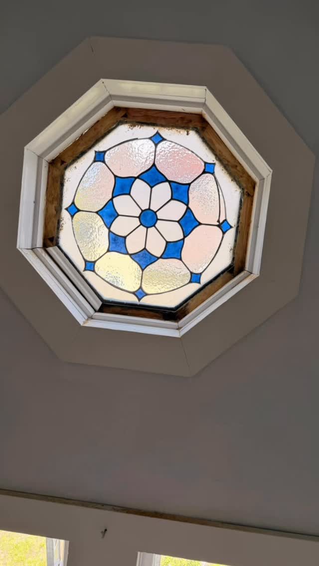 Octagonal stained glass window installed