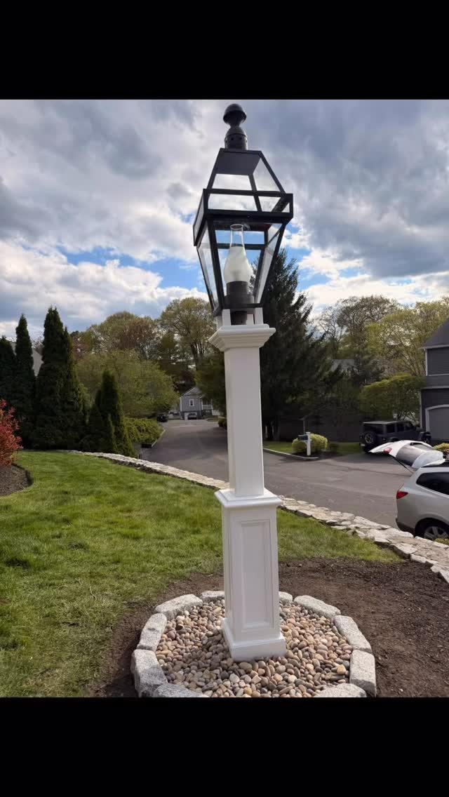 Lamp post installed in a front yard